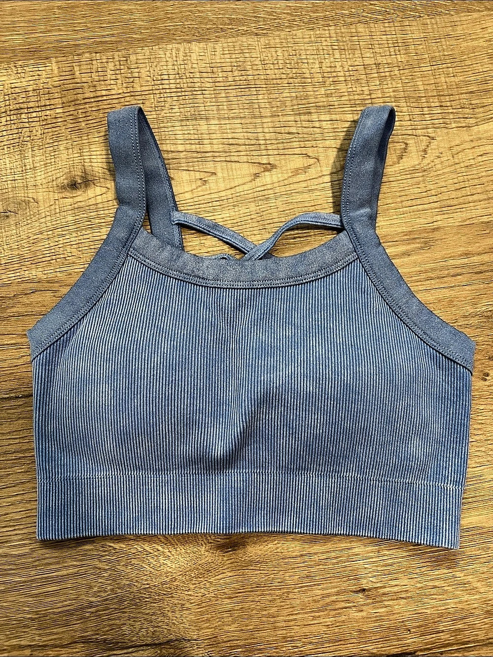 Blue sports bra with built in padding.